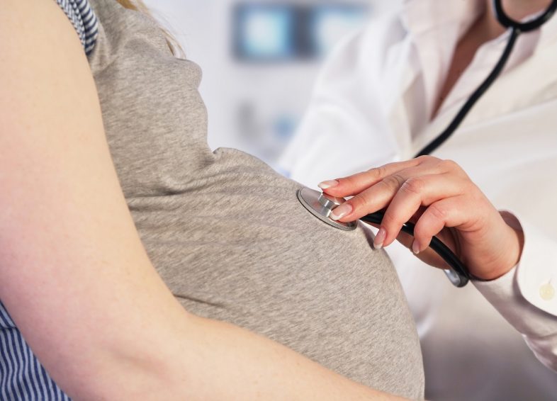 Doctor examining a pregnant woman
